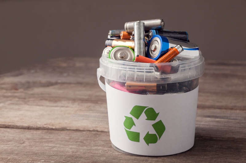 Recycling bin with batteries in it